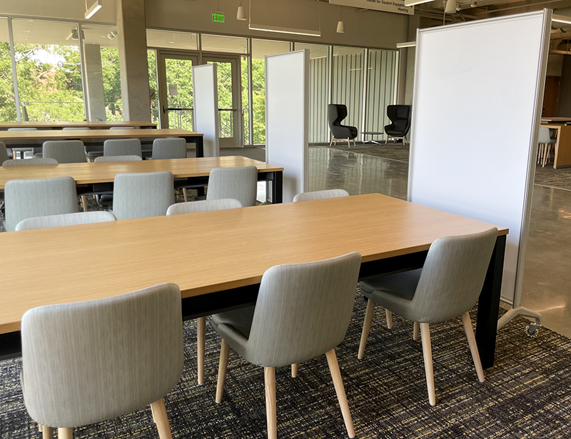 Tables and sitting area at the Student Hub.